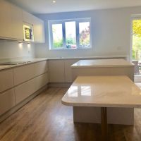 cream handleless kitchen in hampshire