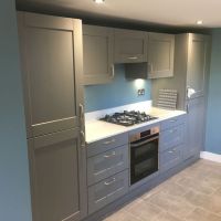 grey handled kitchen fitted by blue design ktichens